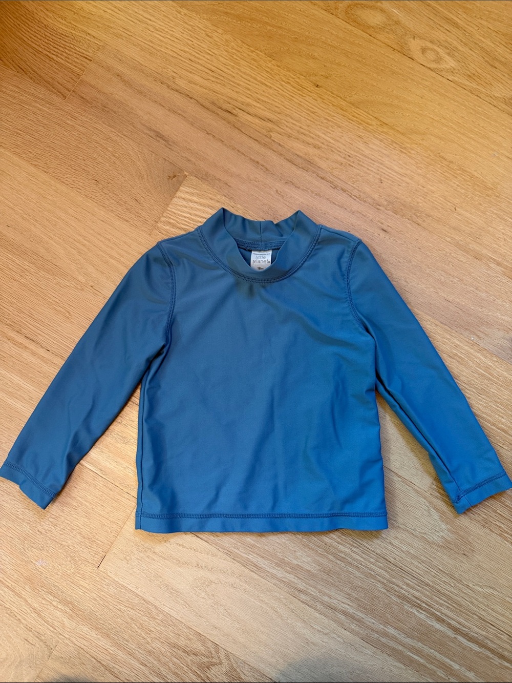 Little Planet long sleeve rashguard top